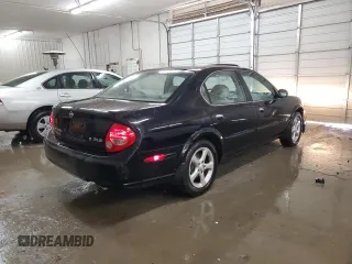 2000 Nissan Maxima GXE z VIN JN1CA31A1YT211725, wystawiony jako Copart lot #47401895 z przebiegiem 122 228 mil mil oraz Szkody całkowita. Historia ofert i sprzedaży dostępna na DreamBid. Obrazek 3.