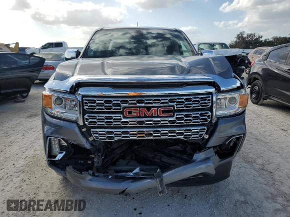 2021 GMC Canyon 4WD Denali with VIN 1GTG6EEN7M1281163, listed as a Copart auction lot 78996944 with 49,299 mi miles and Non Repairable. Bid and sale history available at carsss.com. Image 5.