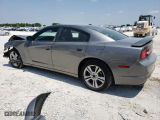 2011 Dodge Charger RT Max with VIN 2B3CM5CT7BH572445, listed as a Copart auction lot 66782634 with 129,743 mi miles and Salvage Title. Bid and sale history available at carsss.com. Image 2.