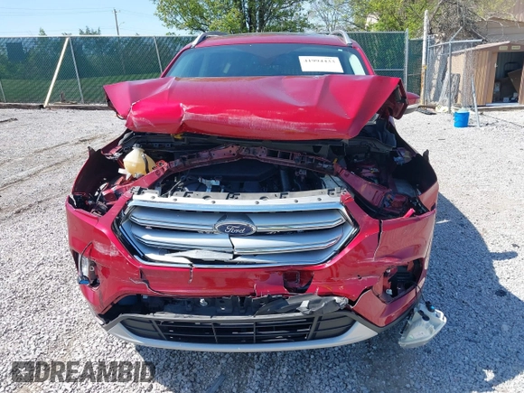 2017 Ford Escape Titanium with VIN 1FMCU0J93HUB20552, listed as a IAAI auction lot 41994433 with 55,772 mi miles. Bid and sale history available at carsss.com. Image 6.