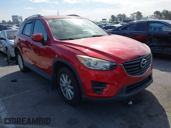 2016 Mazda CX-5 Sport with VIN JM3KE2BY4G0701442, listed as a IAAI auction lot 41682335 with 125,624 mi miles. Bid and sale history available at carsss.com. Image 1.