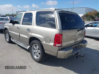 2003 Cadillac Escalade z VIN 1GYEK63N03R155894, wystawiony jako IAAI lot #42336523 z przebiegiem 188 332 mil mil oraz . Historia ofert i sprzedaży dostępna na DreamBid. Obrazek 3.