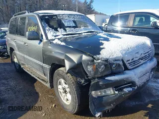 2000 Lexus LX with VIN JT6HT00W6Y0118359, listed as a IAAI auction lot 41369134 with 279,475 mi miles. Bid and sale history available at carsss.com. Image 1.