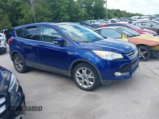 2013 Ford Escape SEL with VIN 1FMCU0H97DUC56750, listed as a IAAI auction lot 42720227 with 239,922 mi miles and . Bid and sale history available at DreamBid. Image 1.