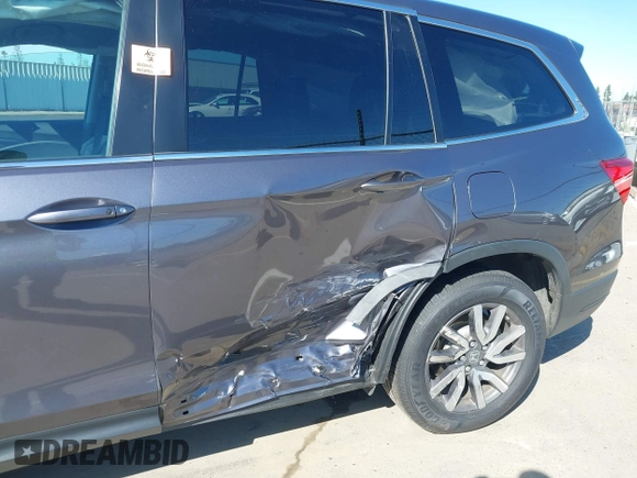 2020 Honda Pilot EX-L with VIN 5FNYF5H51LB020830, listed as a IAAI auction lot 42255746 with 60,503 mi miles and . Bid and sale history available at DreamBid. Image 18.