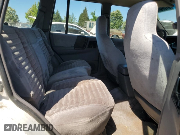 1993 Jeep Grand Cherokee Laredo с VIN 1J4GZ58S2PC654248, выставлен на аукционе Copart как лот 61259735 с пробегом 251 360 миль миль и Списание • Salvage title. История ставок и продаж доступна на DreamBid. Изображение 11.