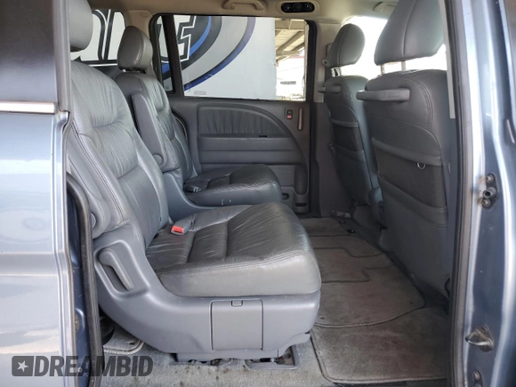 2007 Honda Odyssey EX-L z VIN 5FNRL38647B077250, wystawiony jako Copart lot #56925425 z przebiegiem 159 281 mil mil oraz Szkoda całkowita • Salvage title. Historia ofert i sprzedaży dostępna na DreamBid. Obrazek 11.