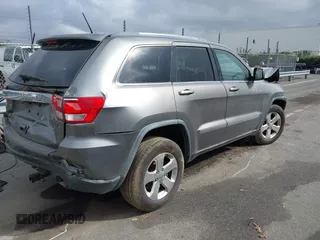 2012 Jeep Grand Cherokee Laredo with VIN 1C4RJFAG8CC298268, listed as a IAAI auction lot 40787833 with 206,486 mi miles. Bid and sale history available at carsss.com. Image 4.