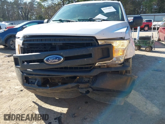 2018 Ford F-150 XL with VIN 1FTMF1CB6JKE60661, listed as a IAAI auction lot 41276885 with 142,090 mi miles. Bid and sale history available at carsss.com. Image 6.