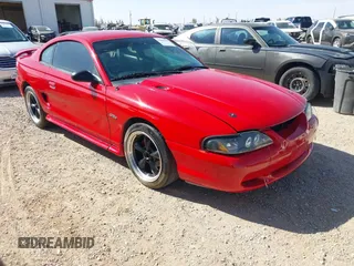 1996 Ford Mustang GT z VIN 1FALP42X2TF146854, wystawiony jako IAAI lot #41885986 z przebiegiem 129 660 mil mil oraz . Historia ofert i sprzedaży dostępna na DreamBid. Obrazek 1.