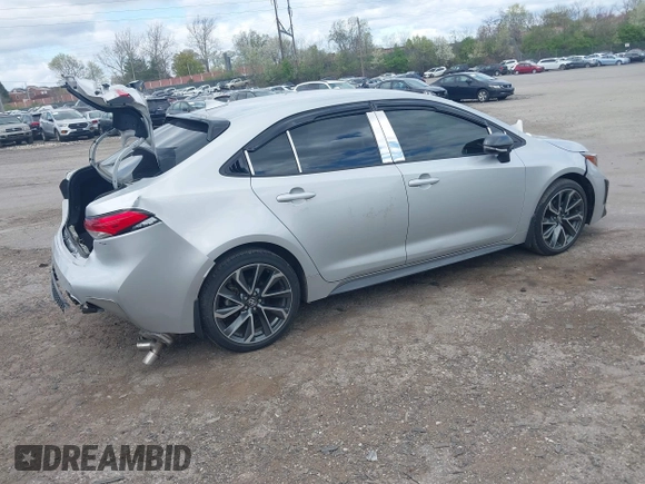 2021 Toyota Corolla SE with VIN 5YFS4MCE2MP066802, listed as a IAAI auction lot 42031552 with 34,075 mi miles. Bid and sale history available at carsss.com. Image 4.