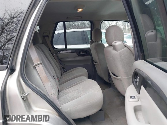 2005 GMC Envoy SLE with VIN 1GKDT13S552332088, listed as a IAAI auction lot 41699178 with 196,869 mi miles. Bid and sale history available at carsss.com. Image 8.