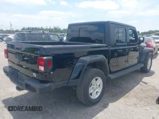 2022 Jeep Gladiator Willys Sport z VIN 1C6HJTAG7NL161701, wystawiony jako IAAI lot #42097144 z przebiegiem 32 989 mil mil oraz . Historia ofert i sprzedaży dostępna na DreamBid. Obrazek 4.
