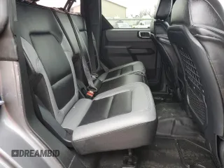 2023 Ford Bronco z VIN 1FMDE5DHXPLC10349, wystawiony jako Copart lot #53951735 z przebiegiem 8 931 mil mil oraz Szkoda całkowita • Salvage title. Historia ofert i sprzedaży dostępna na DreamBid. Obrazek 11.