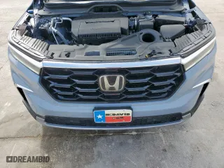 2025 Honda Pilot Touring with VIN 5FNYG2H78SB000571, listed as a Copart auction lot 45391595 with 6,916 mi miles and Salvage Title. Bid and sale history available at carsss.com. Image 13.