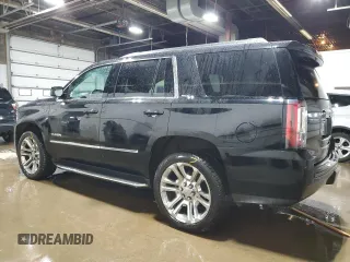 2016 GMC Yukon SLT with VIN 1GKS2BKC1GR440857, listed as a Copart auction lot 52683875 with 171,111 mi miles and Salvage Title. Bid and sale history available at carsss.com. Image 2.