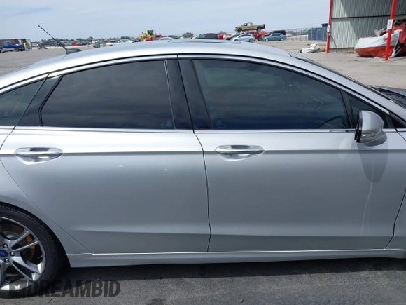 2016 Ford Fusion Titanium with VIN 3FA6P0K90GR132709, listed as a IAAI auction lot 41790873 with 63,269 mi miles and . Bid and sale history available at carsss.com. Image 13.