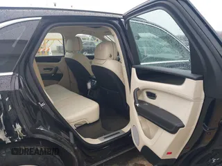 2019 Bentley Bentayga V8 z VIN SJAAM2ZVXKC025218, wystawiony jako IAAI lot #41741586 z przebiegiem 52 457 mil mil oraz . Historia ofert i sprzedaży dostępna na DreamBid. Obrazek 8.