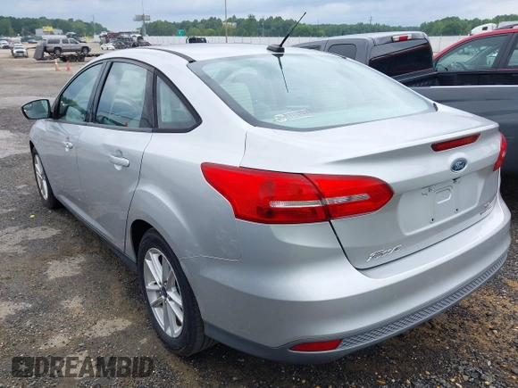 2015 Ford Focus SE with VIN 1FADP3F24FL238308, listed as a IAAI auction lot 42707422 with 134,585 mi miles and . Bid and sale history available at DreamBid. Image 3.