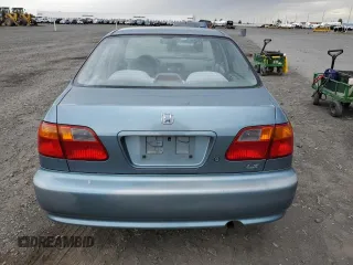 1999 Honda Civic LX with VIN 1HGEJ6577XL039447, listed as a Copart auction lot 55970854 with 100,776 mi miles and Salvage Title. Bid and sale history available at carsss.com. Image 6.