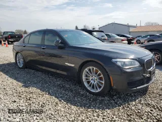 2013 BMW 7 Series 750Li xDrive with VIN WBAYF8C58DD139800, listed as a Copart auction lot 51087605 with 124,436 mi miles and Salvage Title. Bid and sale history available at carsss.com. Image 4.