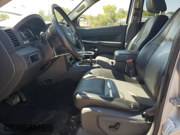 2009 Jeep Grand Cherokee Laredo with VIN 1J8HR48P29C537653, listed as a Copart auction lot 70190404 with 192,796 mi miles and Salvage Title. Bid and sale history available at carsss.com. Image 7.