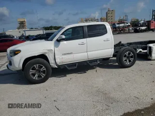 2018 Toyota Tacoma SR5 with VIN 5TFAZ5CN8JX054931, listed as a Copart auction lot 58962895 with 118,875 mi miles and Salvage title. Bid and sale history available at DreamBid. Image 1.
