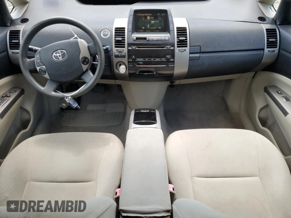 2007 Toyota Prius z VIN JTDKB20U577615386, wystawiony jako Copart lot #61358075 z przebiegiem 187 729 mil mil oraz Czysty tytuł • Clean title. Historia ofert i sprzedaży dostępna na DreamBid. Obrazek 8.