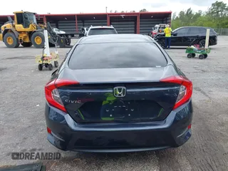 2016 Honda Civic Sedan LX with VIN 19XFC2F52GE069998, listed as a IAAI auction lot 42016233 with 93,990 mi miles. Bid and sale history available at carsss.com. Image 16.