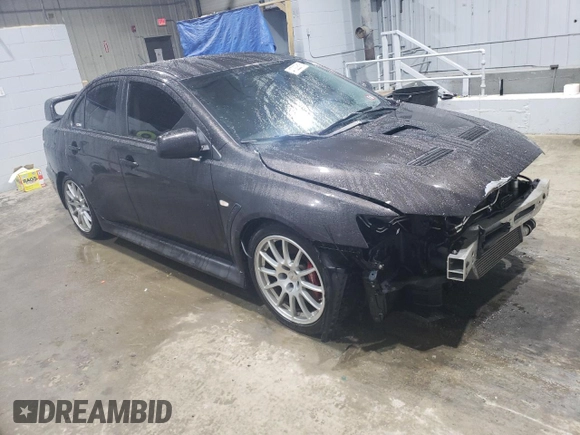 2014 Mitsubishi Lancer Evolution GSR with VIN JA32W8FV5EU017979, listed as a Copart auction lot 47222615 with 109,632 mi miles and Salvage Title. Bid and sale history available at carsss.com. Image 4.