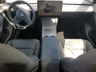 2024 Tesla Model Y with VIN 7SAYGDED1RF052031, listed as a Copart auction lot 61806195 with 5,365 mi miles and Salvage title. Bid and sale history available at DreamBid. Image 8.