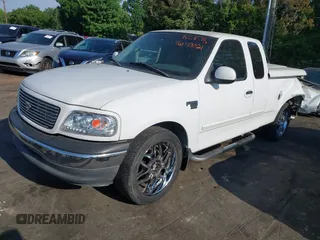 2000 Ford F-150 XL with VIN 1FTRX17L7YNB73649, listed as a IAAI auction lot 42159021 with Not provided miles and . Bid and sale history available at DreamBid. Image 2.