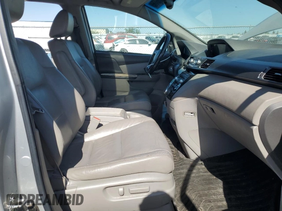 2011 Honda Odyssey Touring с VIN 5FNRL5H92BB063040, выставлен на аукционе Copart как лот 58551765 с пробегом 236 526 миль миль и Списание • Salvage title. История ставок и продаж доступна на DreamBid. Изображение 7.