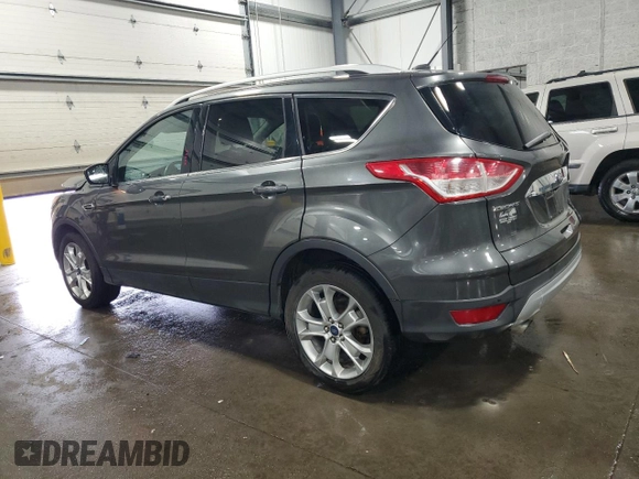 2015 Ford Escape Titanium with VIN 1FMCU9J90FUA26808, listed as a Copart auction lot 54449805 with 184,576 mi miles and Salvage title. Bid and sale history available at DreamBid. Image 2.