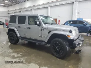 2021 Jeep Wrangler Unlimited Sahara with VIN 1C4JJXP65MW682462, listed as a Copart auction lot 58673385 with 38,714 mi miles and Salvage title. Bid and sale history available at DreamBid. Image 4.