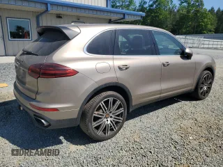 2016 Porsche Cayenne z VIN WP1AA2A25GKA37765, wystawiony jako Copart lot #54698215 z przebiegiem 100 290 mil mil oraz Szkoda całkowita • Salvage title. Historia ofert i sprzedaży dostępna na DreamBid. Obrazek 3.