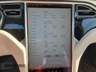 2017 Tesla Model X 90D z VIN 5YJXCBE22HF060645, wystawiony jako Copart lot #57907115 z przebiegiem 55 343 mil mil oraz Szkoda całkowita • Salvage title. Historia ofert i sprzedaży dostępna na DreamBid. Obrazek 9.