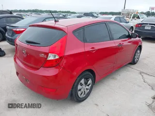 2014 Hyundai Accent GS with VIN KMHCT5AE1EU172027, listed as a IAAI auction lot 42165016 with 140,943 mi miles and . Bid and sale history available at carsss.com. Image 4.