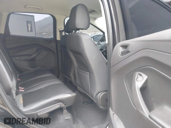 2015 Ford Escape S with VIN 1FMCU0F71FUC05149, listed as a IAAI auction lot 42055622 with 156,738 mi miles and . Bid and sale history available at DreamBid. Image 8.