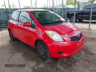 2007 Toyota Yaris z VIN JTDJT923975114065, wystawiony jako IAAI lot #42074696 z przebiegiem 116 648 mil mil oraz . Historia ofert i sprzedaży dostępna na DreamBid. Obrazek 1.