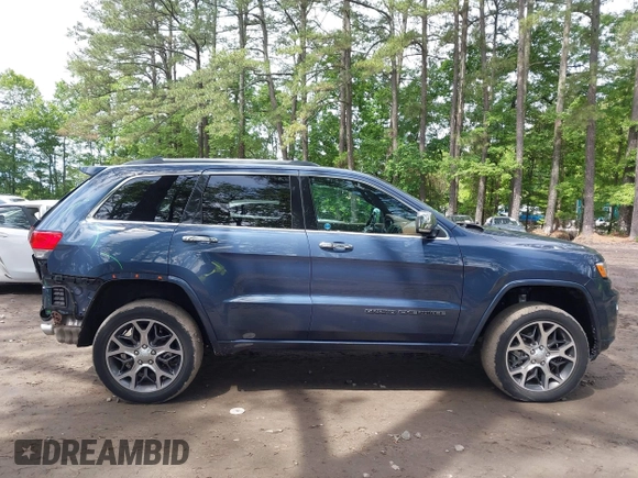 2021 Jeep Grand Cherokee High Altitude with VIN 1C4RJFCG3MC595186, listed as a IAAI auction lot 42325857 with 44,387 mi miles and . Bid and sale history available at DreamBid. Image 14.