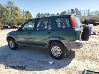 2000 Honda CR-V LX with VIN JHLRD1840YC033134, listed as a Copart auction lot 48556665 with 202,774 mi miles and Salvage Title. Bid and sale history available at carsss.com. Image 2.