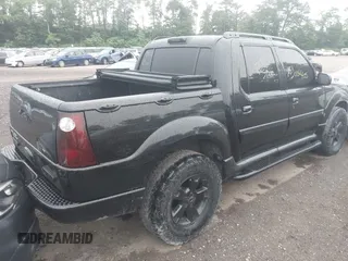2005 Ford Explorer Sport Trac XLS z VIN 1FMZU77K35UB14856, wystawiony jako IAAI lot #42576244 z przebiegiem Nie podano mil oraz . Historia ofert i sprzedaży dostępna na DreamBid. Obrazek 4.