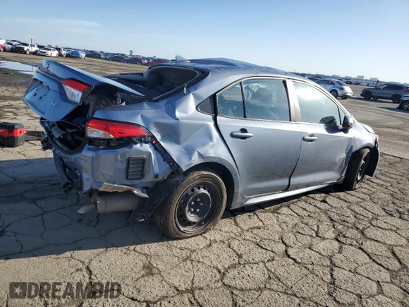 2021 Toyota Corolla LE with VIN 5YFEPMAE4MP267852, listed as a Copart auction lot 49284315 with 27,157 mi miles and Salvage Title. Bid and sale history available at DreamBid. Image 3.
