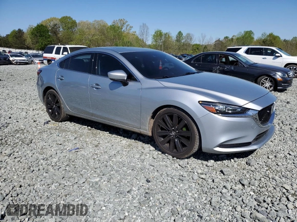 2018 Mazda 6 Grand Touring with VIN JM1GL1TY0J1324994, listed as a Copart auction lot 52306035 with 72,974 mi miles and Salvage Title. Bid and sale history available at DreamBid. Image 4.