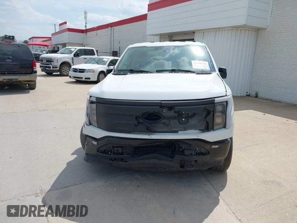 2023 Ford F-150 Lightning Pro with VIN 1FTVW1EL2PWG18764, listed as a IAAI auction lot 41908278 with 16,276 mi miles and . Bid and sale history available at DreamBid. Image 12.