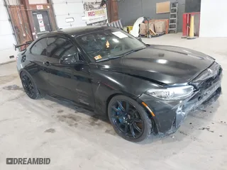 2020 BMW M2 Competition with VIN WBS2U7C09L7F85590, listed as a IAAI auction lot 41836200 with 59,729 mi miles. Bid and sale history available at carsss.com. Image 1.
