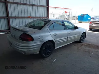 2001 Pontiac Grand Am SE with VIN 1G2NE52T81M648017, listed as a IAAI auction lot 42354372 with 206,086 mi miles and . Bid and sale history available at DreamBid. Image 4.