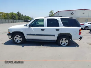 2003 Chevrolet Tahoe LS with VIN 1GNEC13V73R265144, listed as a IAAI auction lot 42464386 with 238,249 mi miles and . Bid and sale history available at DreamBid. Image 14.