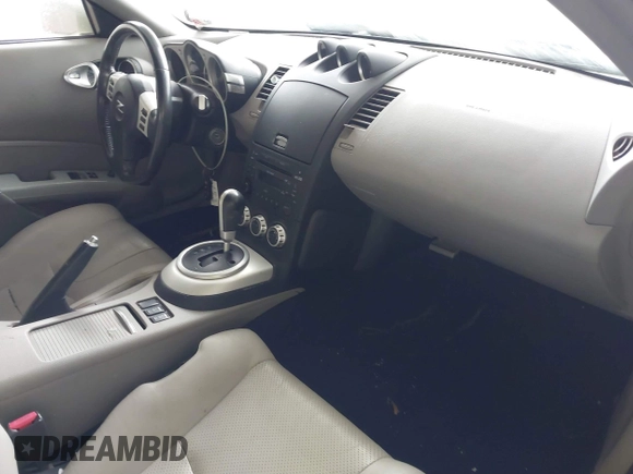 2006 Nissan 350Z Touring z VIN JN1AZ34D86M307042, wystawiony jako IAAI lot #41016528 z przebiegiem 124 303 mil mil oraz . Historia ofert i sprzedaży dostępna na DreamBid. Obrazek 5.